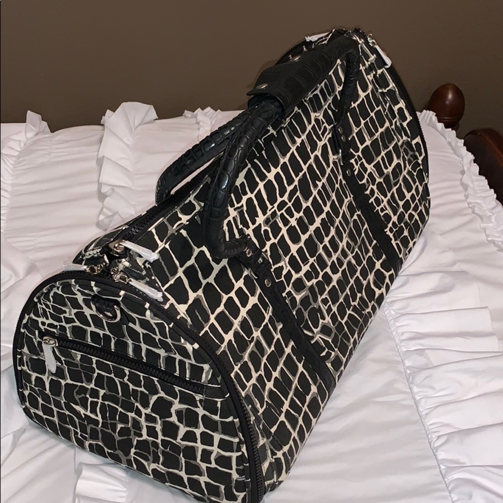 Brand new duffle bag with garment bag built in.